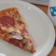 Illustration for article titled You can cheat Domino’s app to get free pizza by taking photos of photos of pizzaem/em